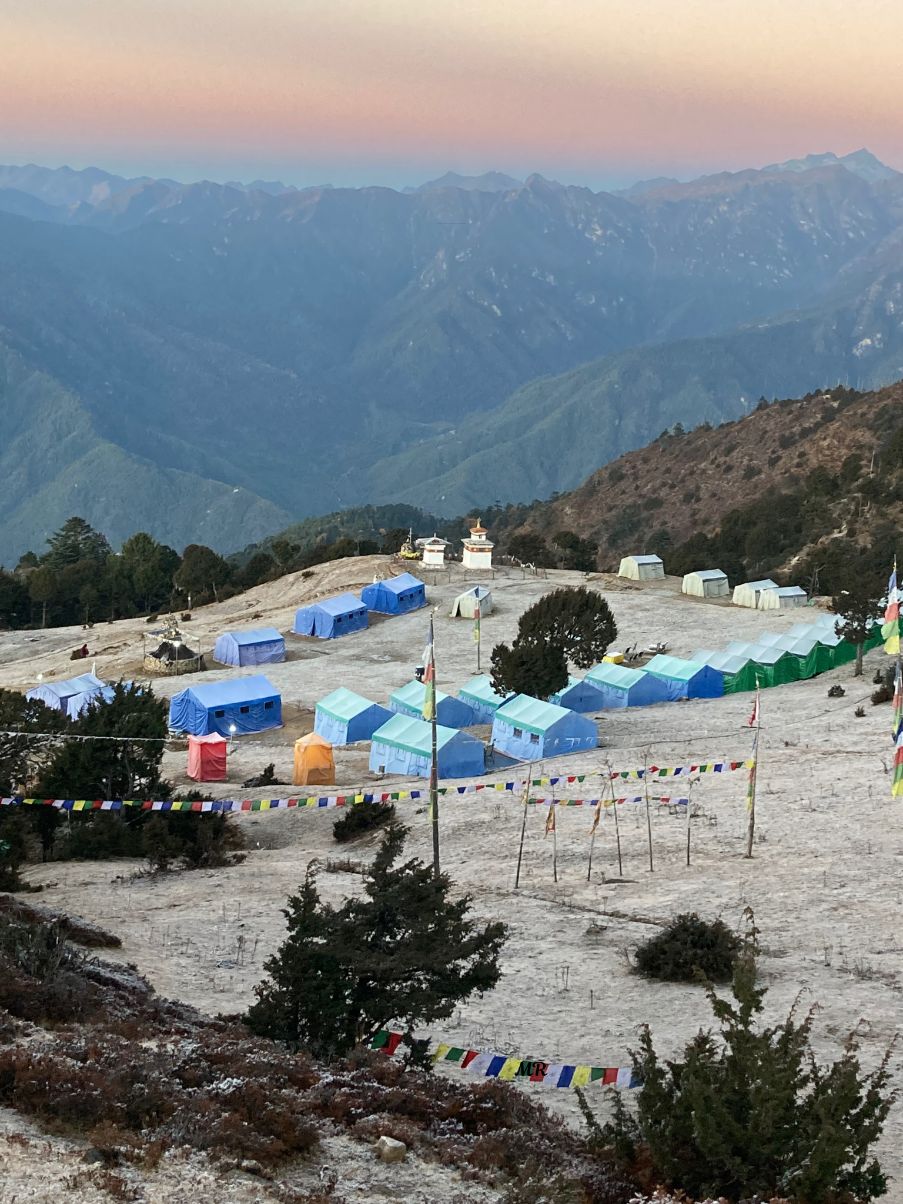 Dawn breaks quietly over the Himalayas, revealing the serene beauty of Bhutan’s high places.
